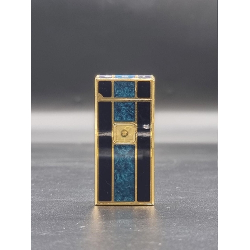 1662 - A vintage Colibri gilt metal and blue lacquer lighter, 6.5cm high.