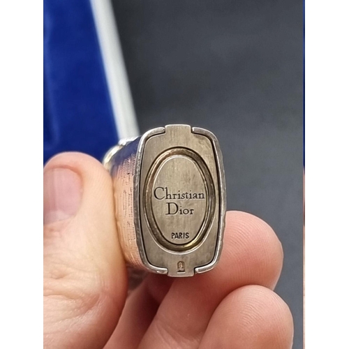 1665 - A Christian Dior lighter, in fitted box.