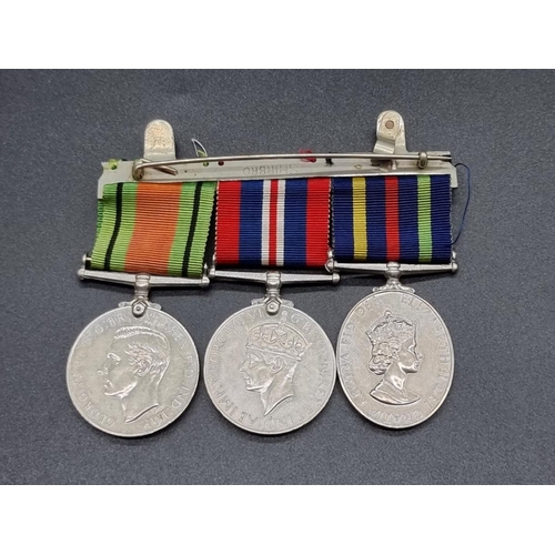 1678 - Medals: a World War II pair; together with Civil Defence Medal.