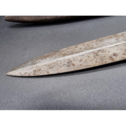 1684 - A World War I French trench or fighting knife and sheath, the twin edged 16.5cm blade stamped 'Coute... 