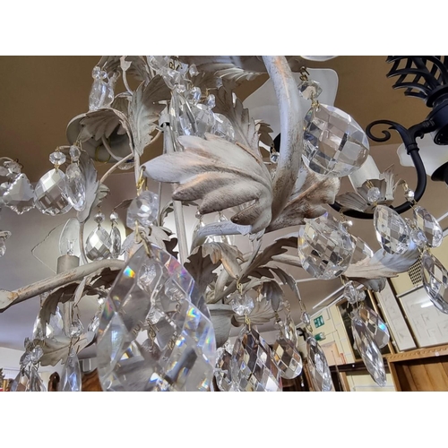 1786 - A white painted and faceted drop five branch ceiling light, 55cm high; together with a pair of ... 