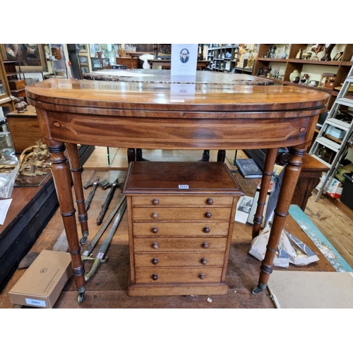 1795 - A George III mahogany, line inlaid and satinwood crossbanded D shape card table, with double gateleg... 