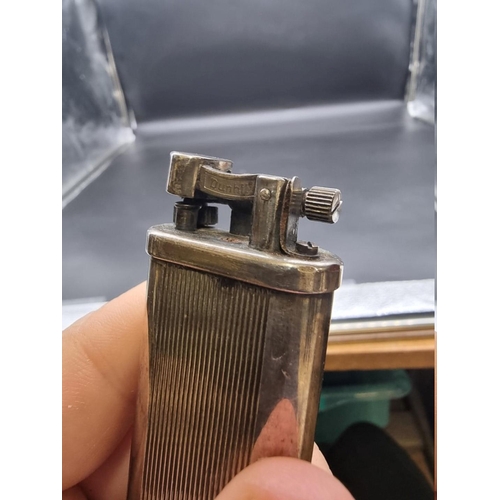 1647 - A vintage Dunhill silver plated 'tallboy' table lighter, 10cm high.