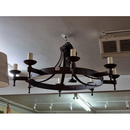 1439 - A steel eight branch ceiling light, 73cm diameter.