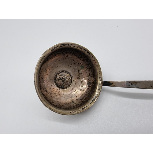 582 - A Georgian silver and baleen toddy ladle, with coin inset bowl, 34.5cm.... 