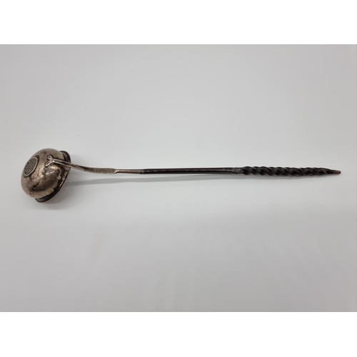 582 - A Georgian silver and baleen toddy ladle, with coin inset bowl, 34.5cm.... 