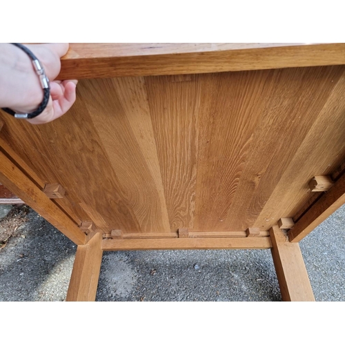 1000 - A contemporary pale oak coffee table, 85cm wide x 36cm high.