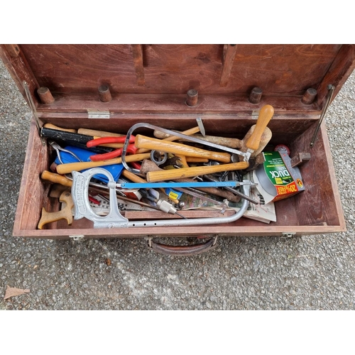 1058 - A small wooden chest containing tools. 