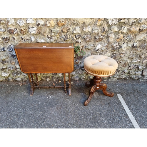 1065 - An Edwardian Sutherland table; together with a walnut piano stool. 