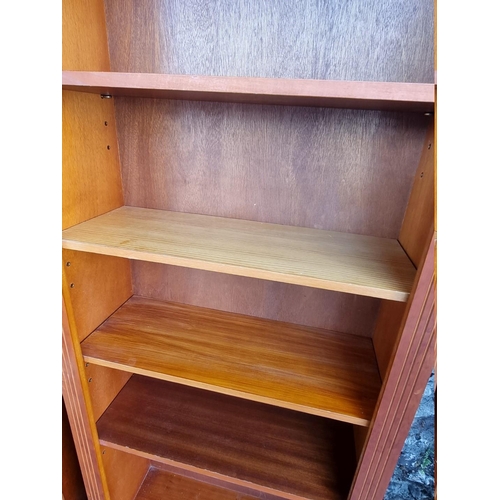 1070 - A pair of reproduction open bookcases, 77cm wide x 184cm high.