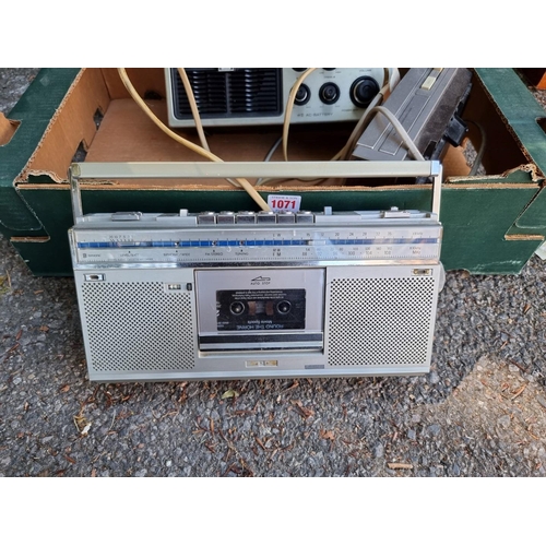 1071 - An old Ekco radio; together with a Phillips bass reflex radio and other radios. ... 