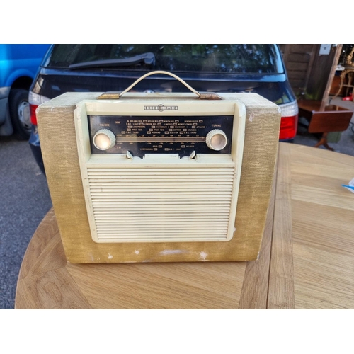 1071 - An old Ekco radio; together with a Phillips bass reflex radio and other radios. ... 