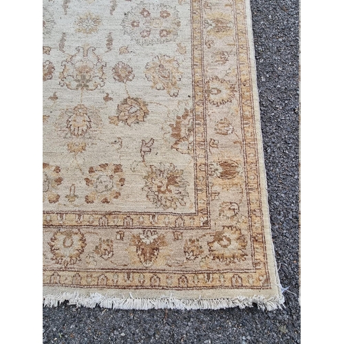 1090 - A floral rug on cream ground, 182cm x 123cm. 