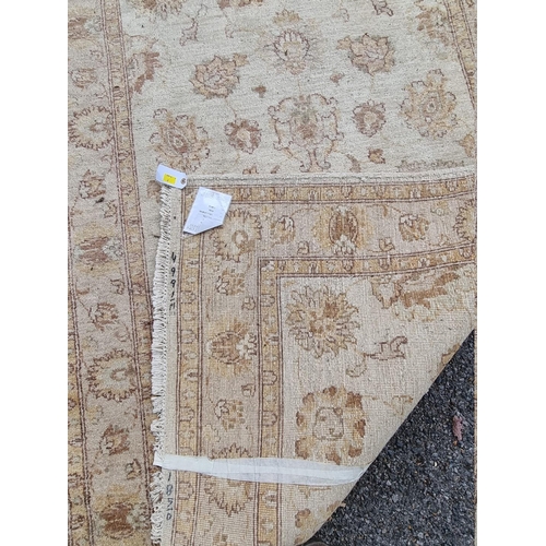 1090 - A floral rug on cream ground, 182cm x 123cm. 