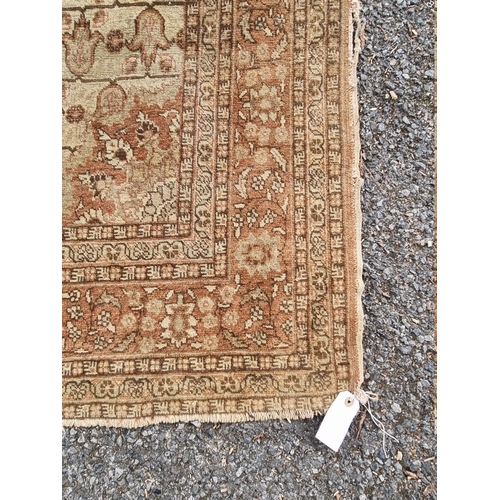 1091 - A pair of Persian rugs, having central floral medallions, with floral cartouches to each corner... 