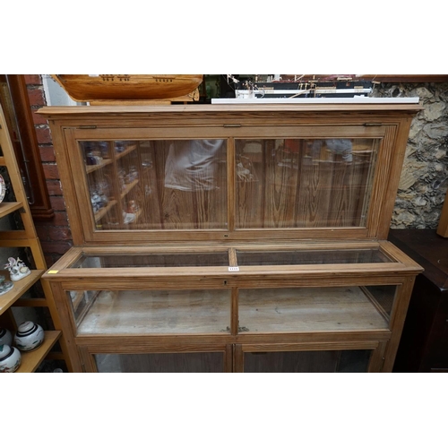 1111 - An old pitch pine display cabinet, 146cm high x 117.5cm wide. 