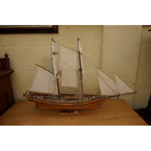 1165 - A wood model of the ship 'Brick Negrier, 1890', 85cm long. 