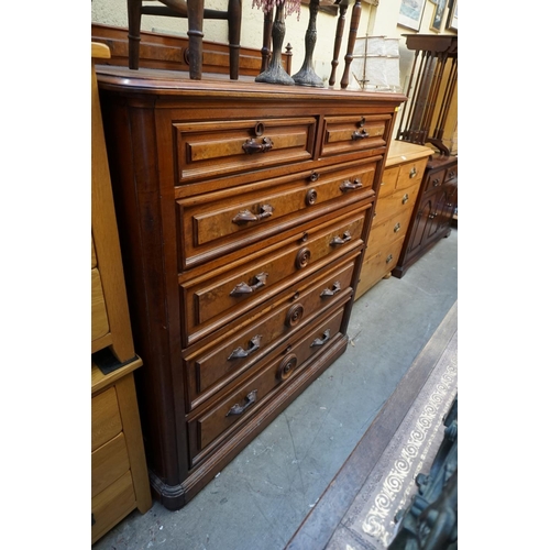 1166 - A Victorian walnut and figured walnut chest of drawers, 122cm wide. 