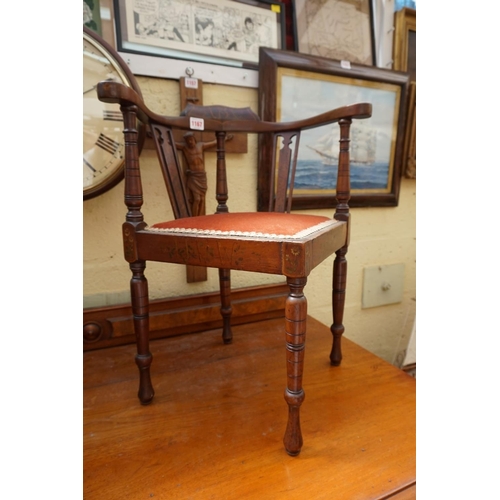 1167 - A circa 1900 mahogany and painted child's corner chair, decorated with flowers and letters from... 