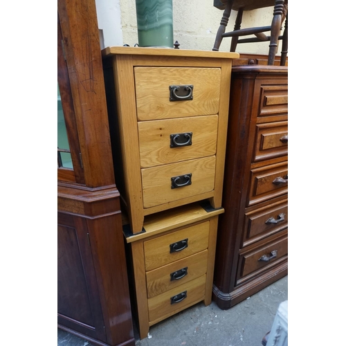 1168 - A pair of contemporary pale oak bedside chests, 66cm high x 48cm wide. 