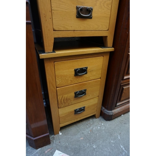 1168 - A pair of contemporary pale oak bedside chests, 66cm high x 48cm wide. 