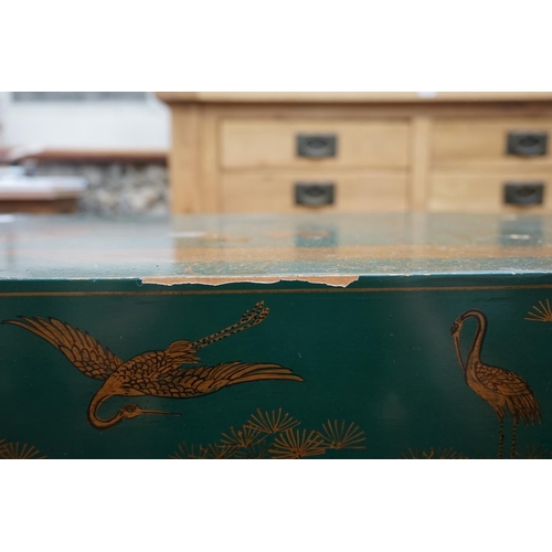 1176 - A bamboo and green lacquered two tier occasional table, labelled 'Maitland-Smith', with chinoiserie ... 