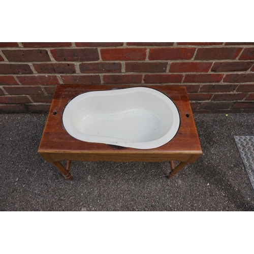 1178 - An old walnut and cane commode stool, 58.5cm wide.