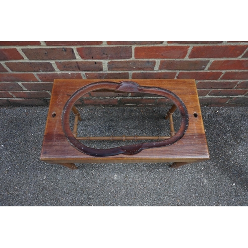 1178 - An old walnut and cane commode stool, 58.5cm wide.