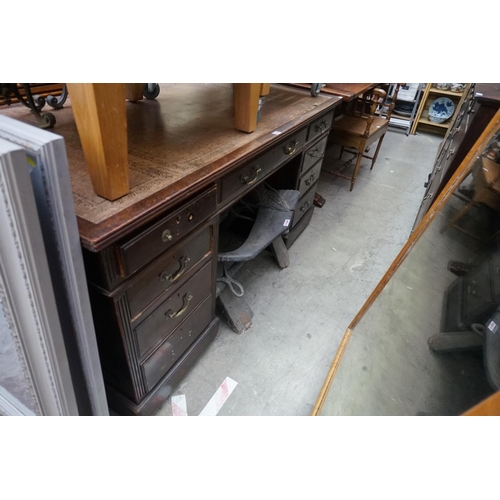 1181 - An early 20th century mahogany pedestal desk, 152.5cm wide. 