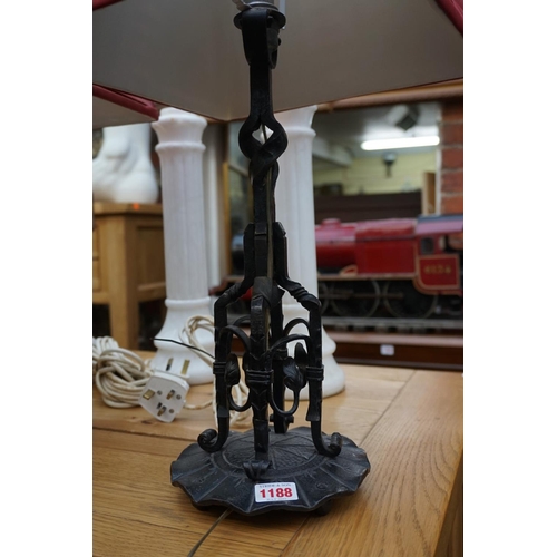 1188 - A pair of wrought iron table lamps, height including shades 57.5cm.