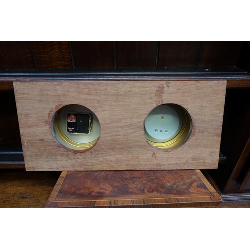 1194 - A brass clock and barometer set, on mahogany plaque, 49.5 x 22cm.