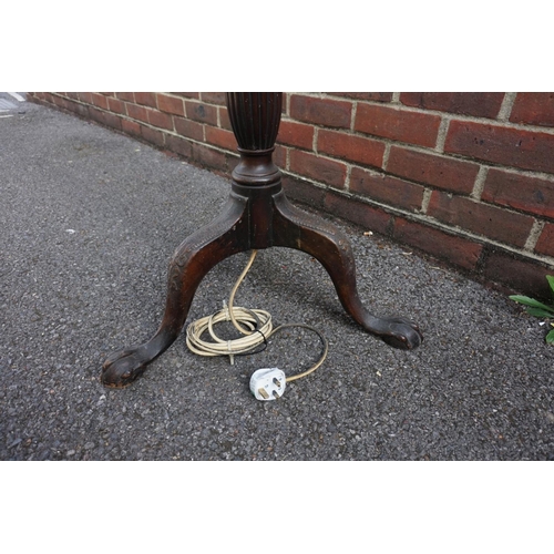 1196 - An old mahogany tripod standard lamp.