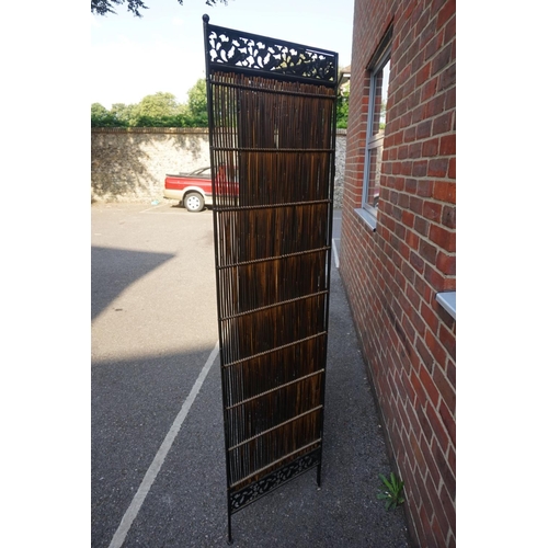 1197 - A bamboo and metal three fold screen, 81.5cm high x 143cm wide. 