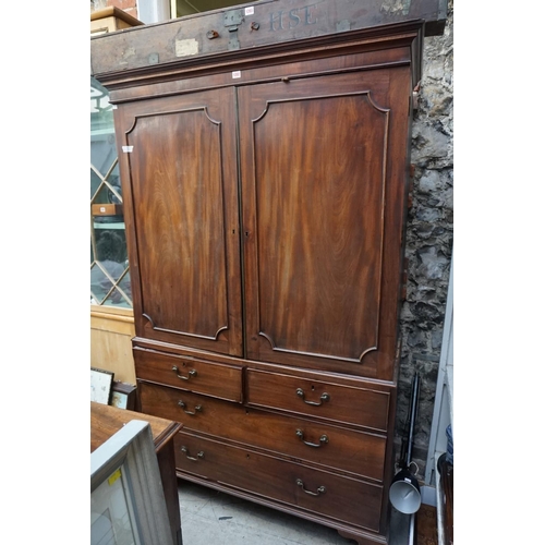 1202 - A George III mahogany linen press, enclosing four trays, 125cm wide.