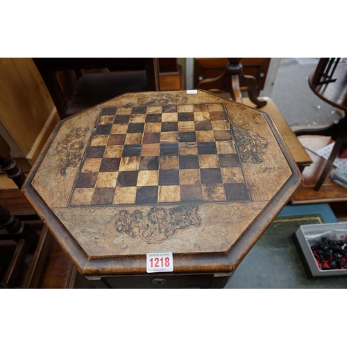 1218 - A Victorian walnut and chequer board inlaid octagonal trumpet form work table; together with a Staun... 