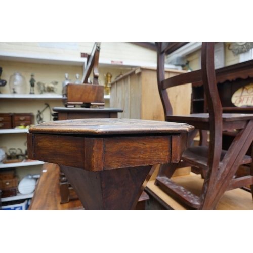 1218 - A Victorian walnut and chequer board inlaid octagonal trumpet form work table; together with a Staun... 