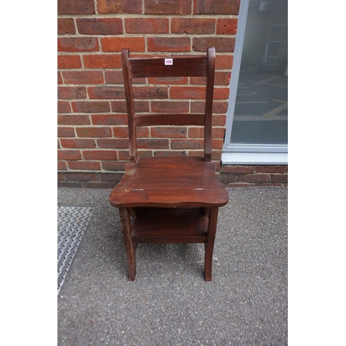 1226 - A modern hardwood metamorphic library chair.  