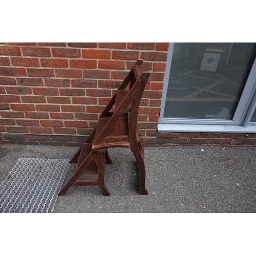 1226 - A modern hardwood metamorphic library chair.  