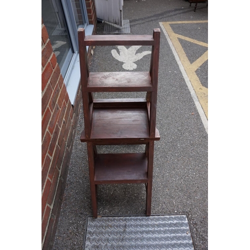 1226 - A modern hardwood metamorphic library chair.  