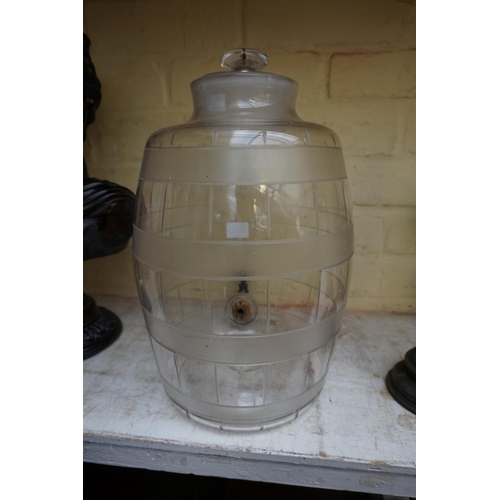 1233 - An old clear and etched glass spirit barrel and stopper, with brass tap, 35cm high. ... 