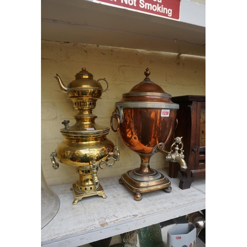 1238 - A 19th century copper and brass samovar, 44cm high; together with another brass tea urn.... 