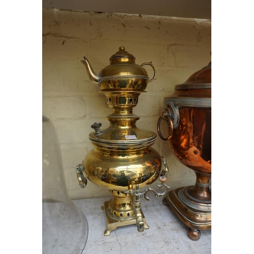 1238 - A 19th century copper and brass samovar, 44cm high; together with another brass tea urn.... 