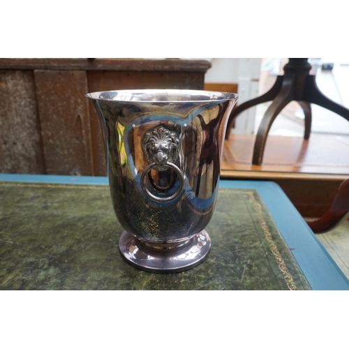 1242 - An electroplated twin handled wine cooler, 23.5cm high; together with a large electroplated salver, ... 