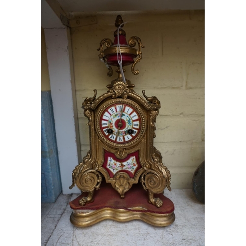 1247 - A gilt spelter and porcelain mounted clock garniture, the clock 37cm high, with pendulum. ... 