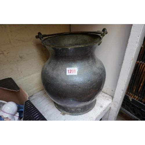 1269 - A large old plated metal swing handled vessel, height including handle 39cm, (wear to plate).... 