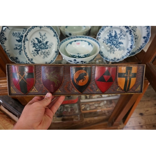 1288 - A group of eight polychrome painted regimental shields, each 8.5cm high, on two stands, to include: ... 