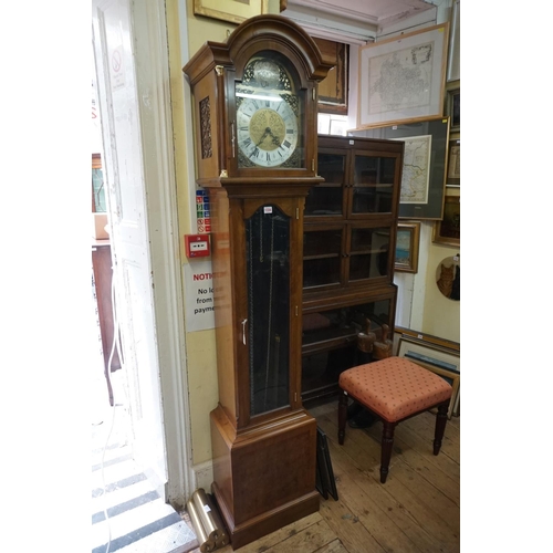 1334 - A good reproduction walnut longcase clock, the 10in arched dial inscribed 'Canham, London', 198cm hi... 