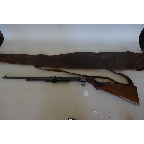 1765 - A BSA Mod L .177 Cal air rifle, with leather sleeve.