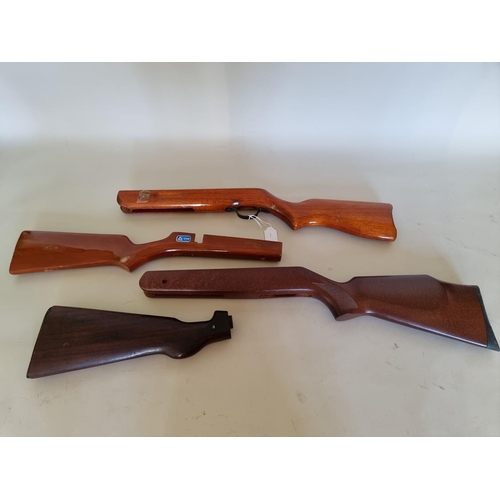 1770 - Four various air rifle stocks.