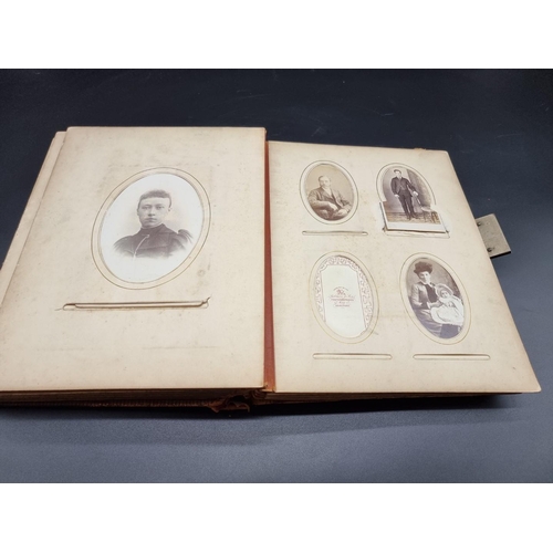 147 - CARTE DE VISITE ALBUM: an album of approx 74 cartes des visite and cabinet cards, loosely inser... 